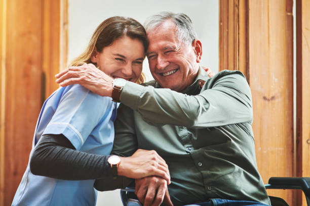 Caregiver helping senior patient with post-surgery home care and recovery support in Miami, FL